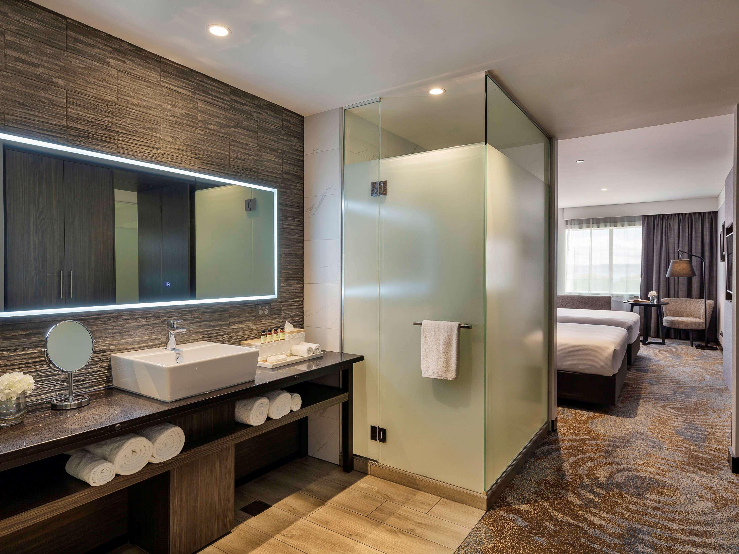 Pullman Rotorua Hotel Luaran gambar A bathroom at the hotel